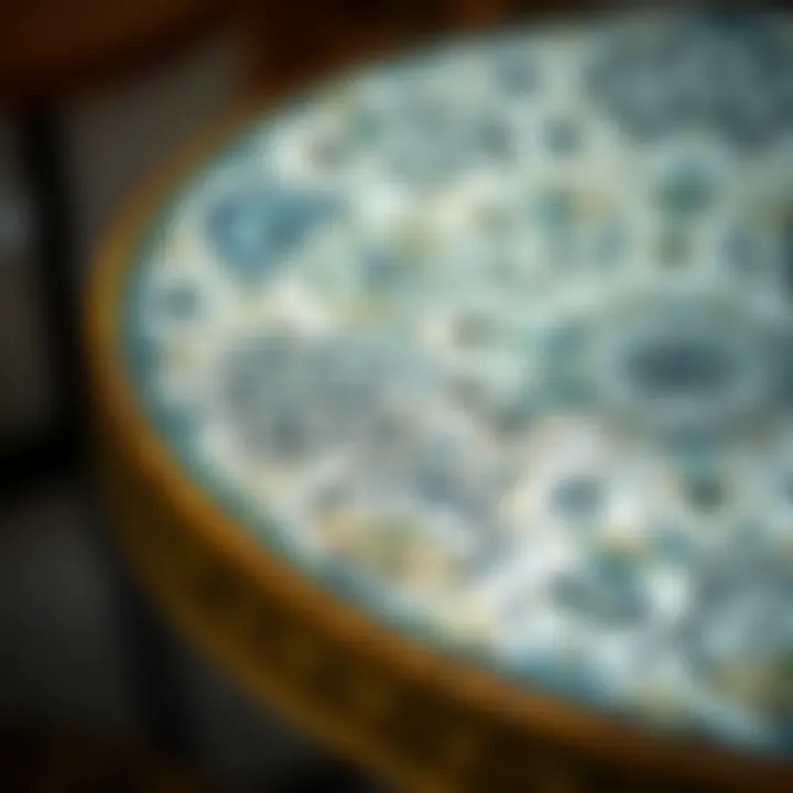 Close-up of intricate ceramic patterns on a bistro table