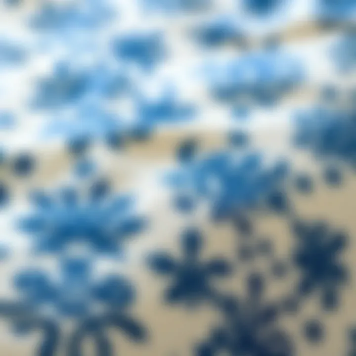 Close-up of intricate fabric patterns on a blue and white duvet cover