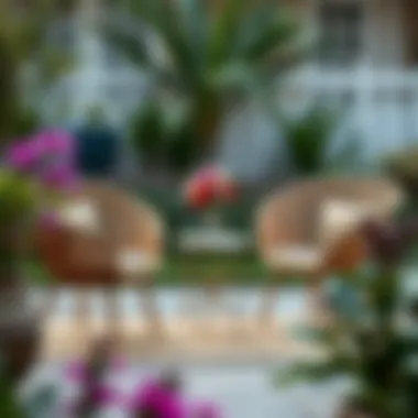 Trendy rattan chairs paired with a chic side table in a garden setting