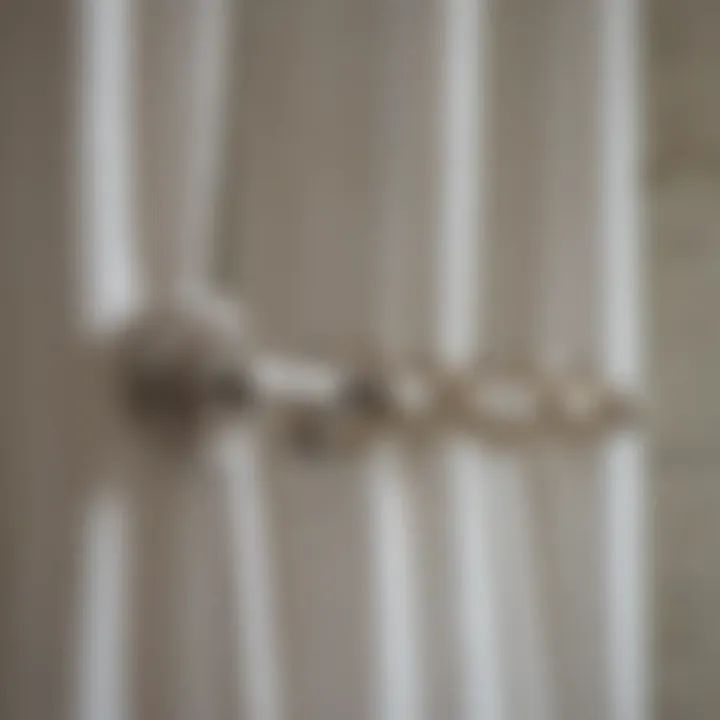 Close-up of luxurious materials used in long shower curtain hooks