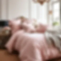 Elegant pale pink bedding set arranged on a luxurious bed
