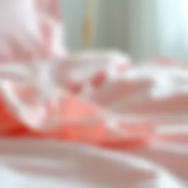 Close-up of soft fabric texture of pale pink bedding