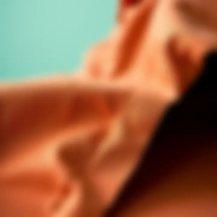 Close-up of the fabric texture of a rust-colored sheet showcasing its quality and craftsmanship