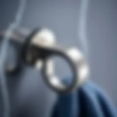 Close-up of brushed silver towel hook showcasing its sleek design
