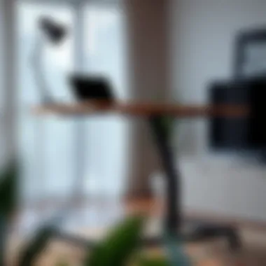 Ergonomic Workspace with Laptop An ergonomic workspace featuring a height adjustable table with a laptop