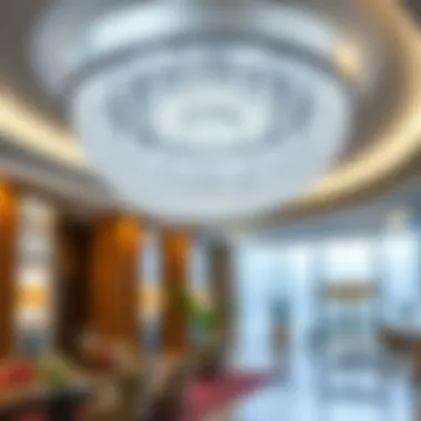 Artistic silver ceiling light fixture in a luxury hotel lobby