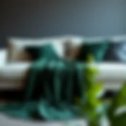 Luxurious dark green king blanket draped over a stylish sofa
